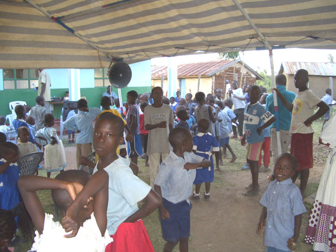 orphans enjoy a meal